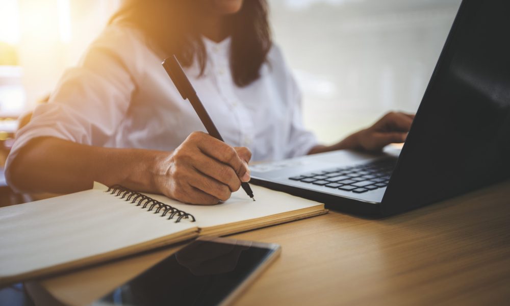 young woman  with learning language during online courses using netbook